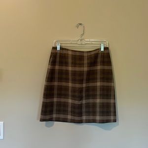 Brown Barami mini skirt with cream and black pin stripes. Size 6.